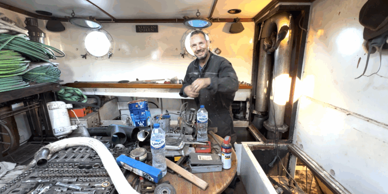 Man working on a boat interior
